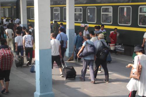 les chinois dans les gares